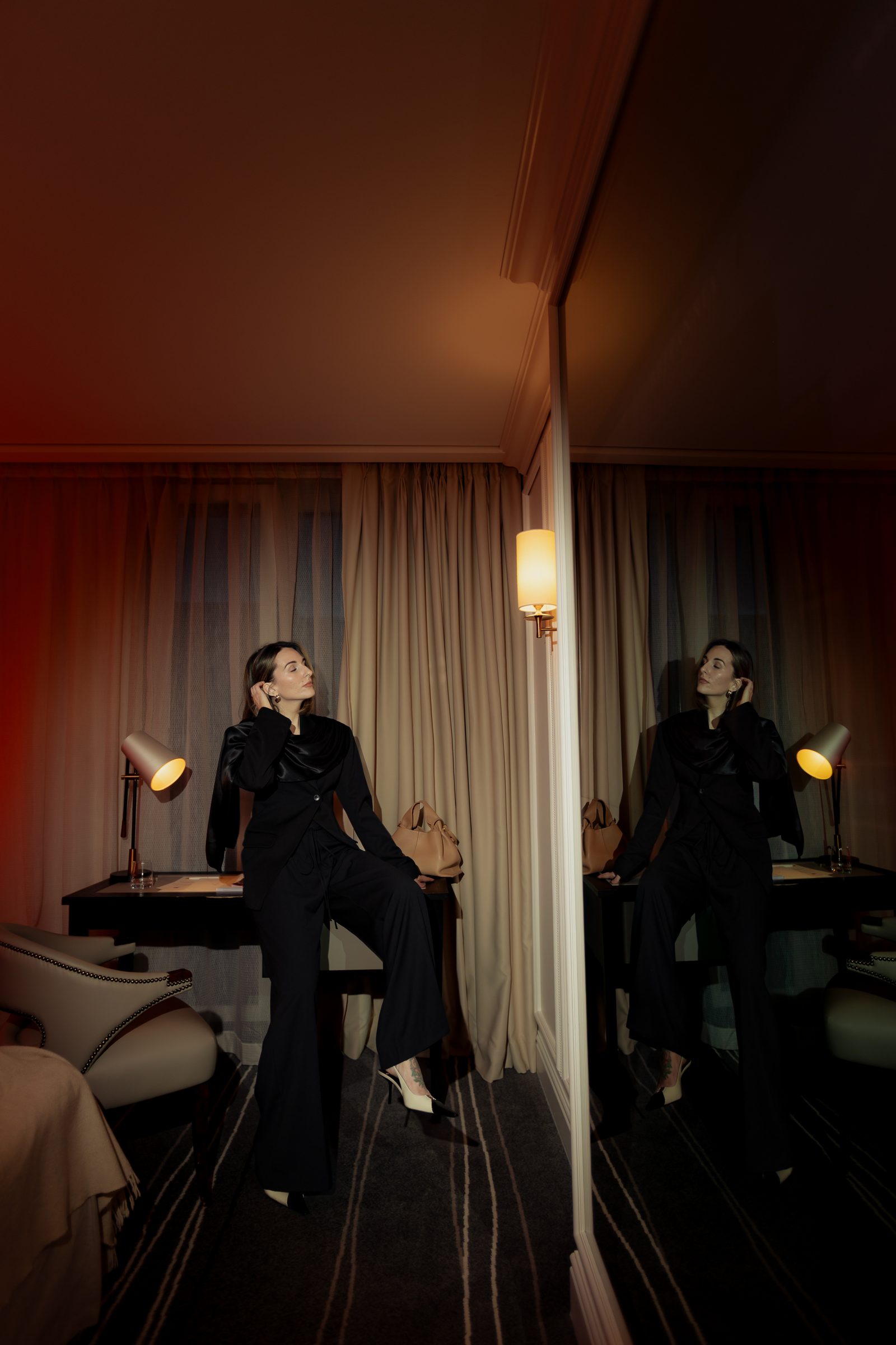 Sara mirror reflection black outfit desk editorial