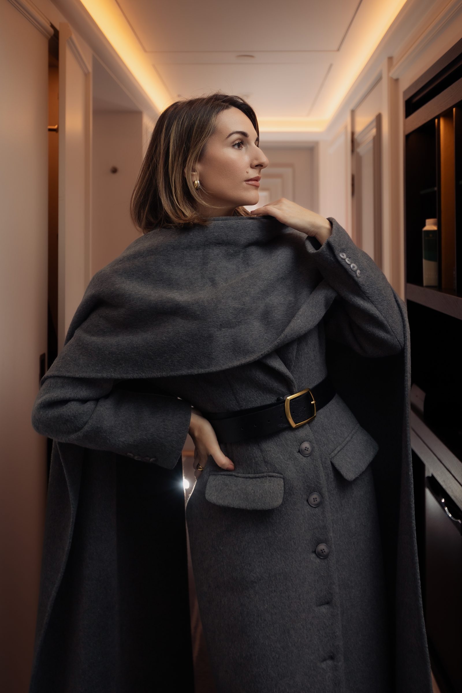 Sara grey wrap coat hallway portrait editorial