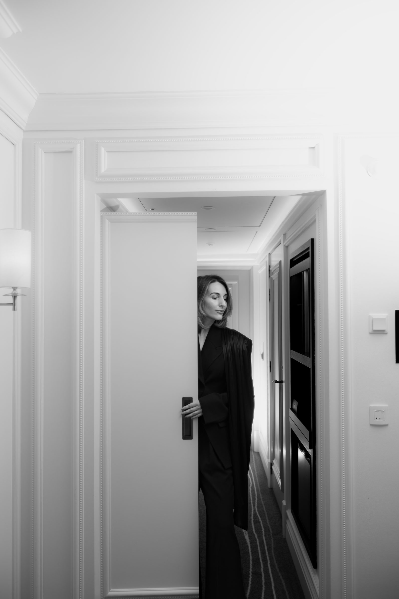 Sara black and white doorway portrait hotel editorial