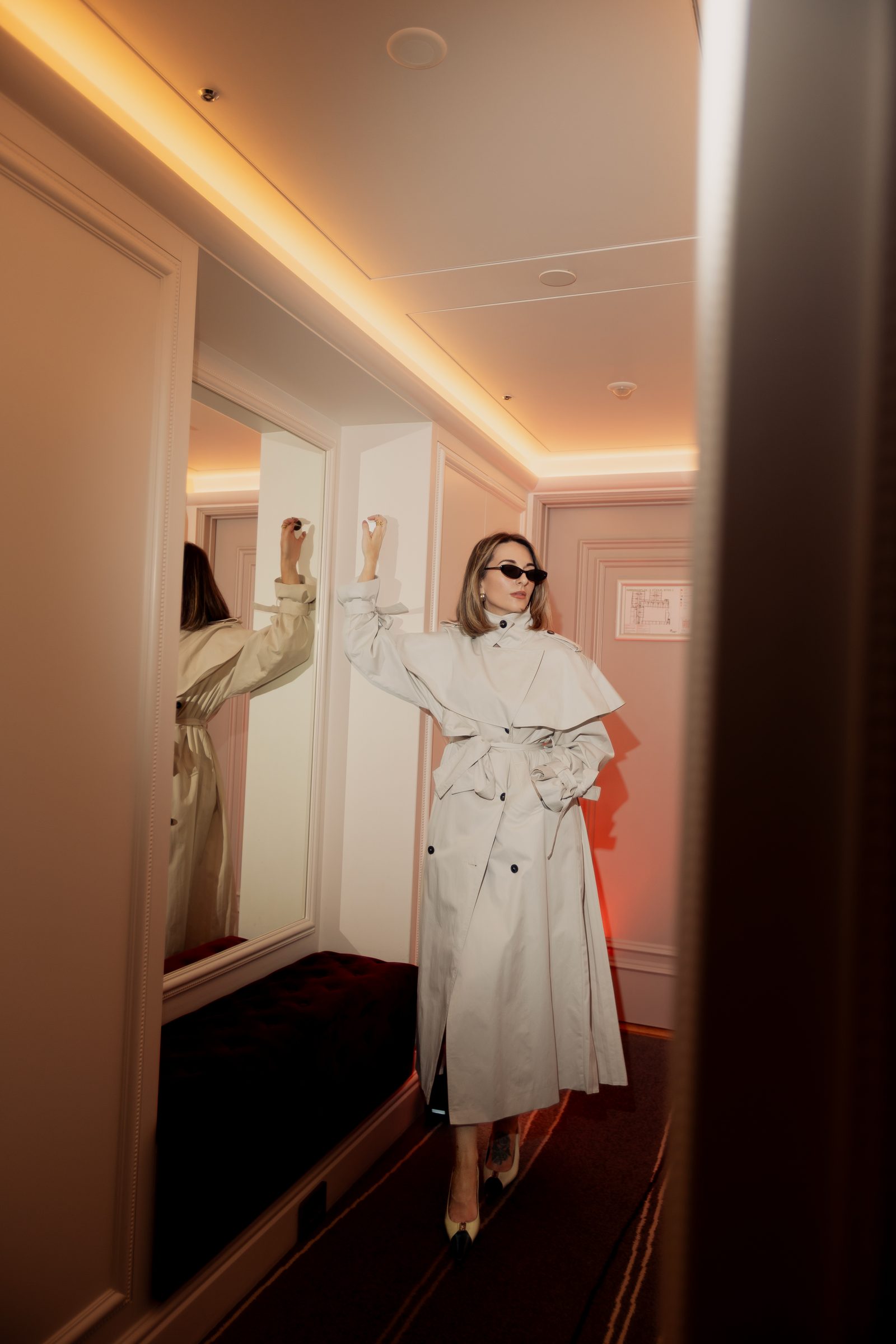 Sara cream oversized trench sunglasses hallway
