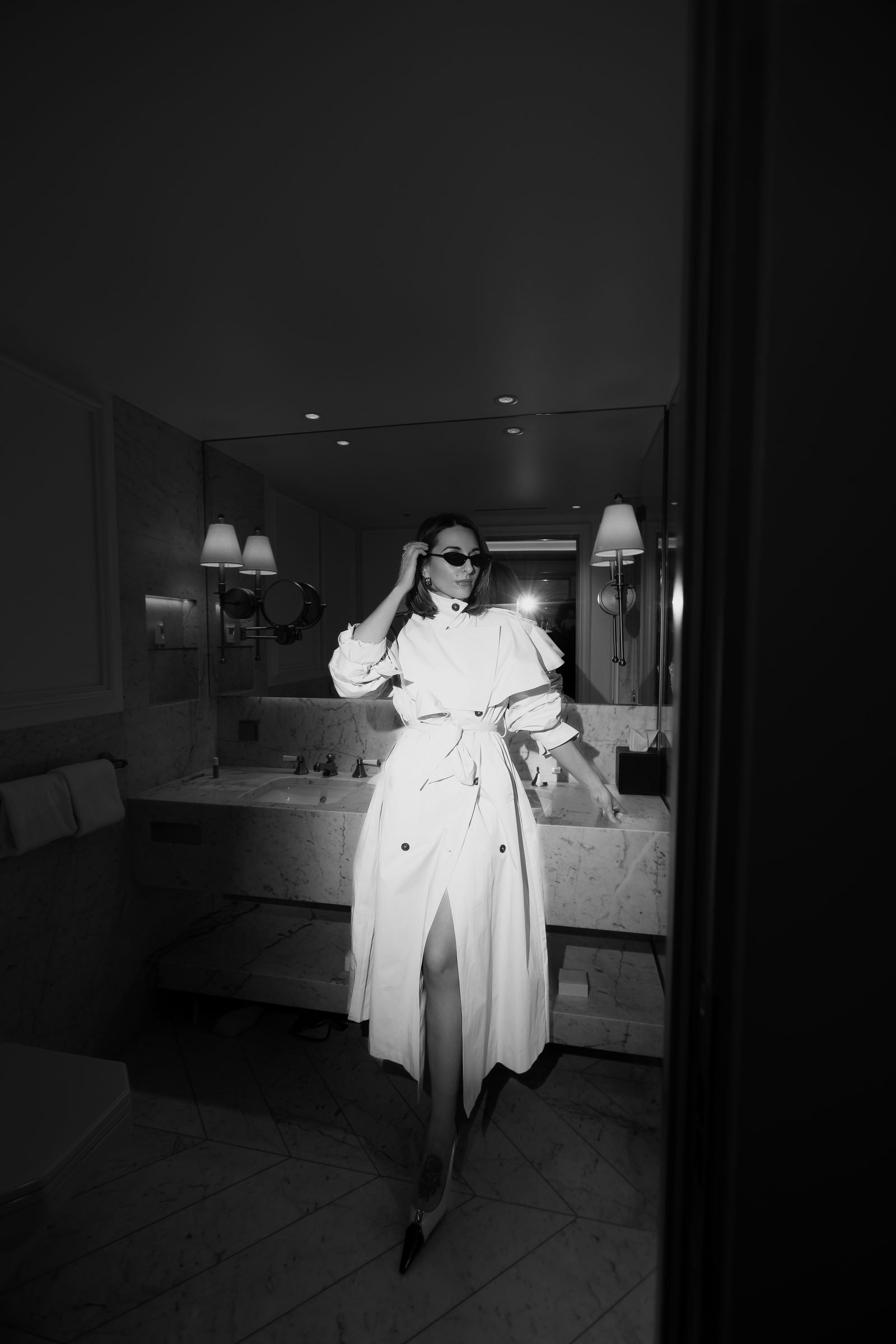 Sara cream trench bathroom black and white editorial