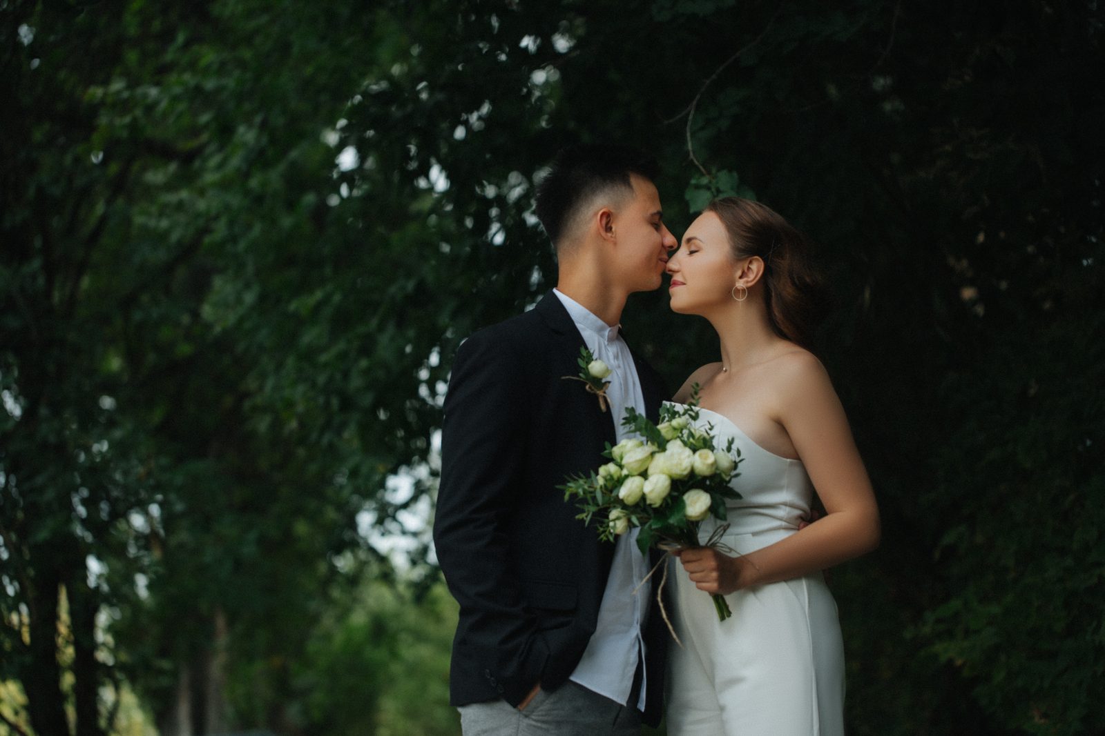 Wedding bride groom intimate moment eyes closed portrait