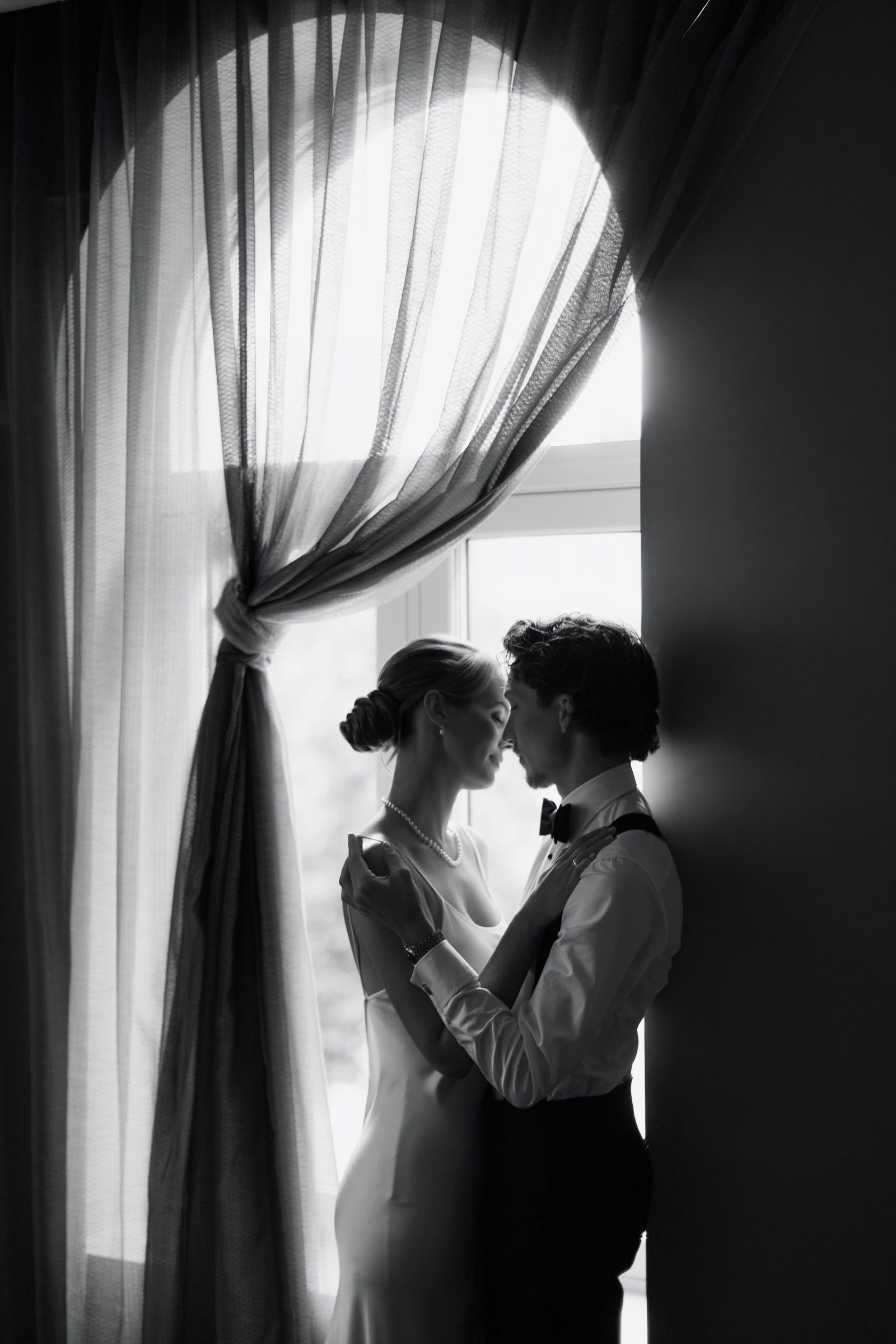 Wedding britannia hotel window silhouette bw