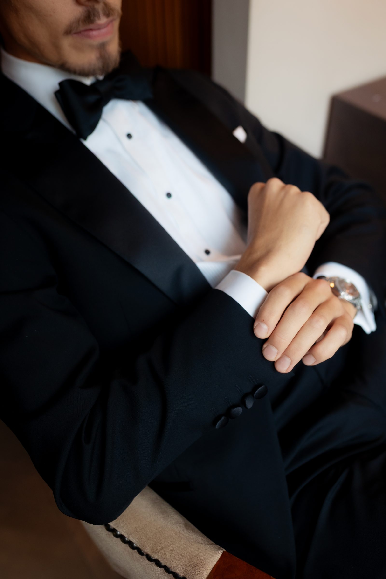 Wedding groom tuxedo detail closeup color