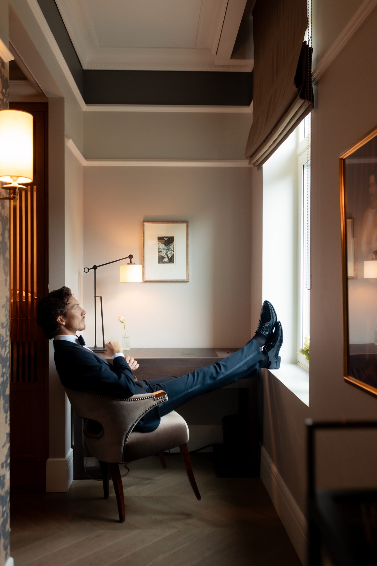 Wedding groom getting ready window seat color