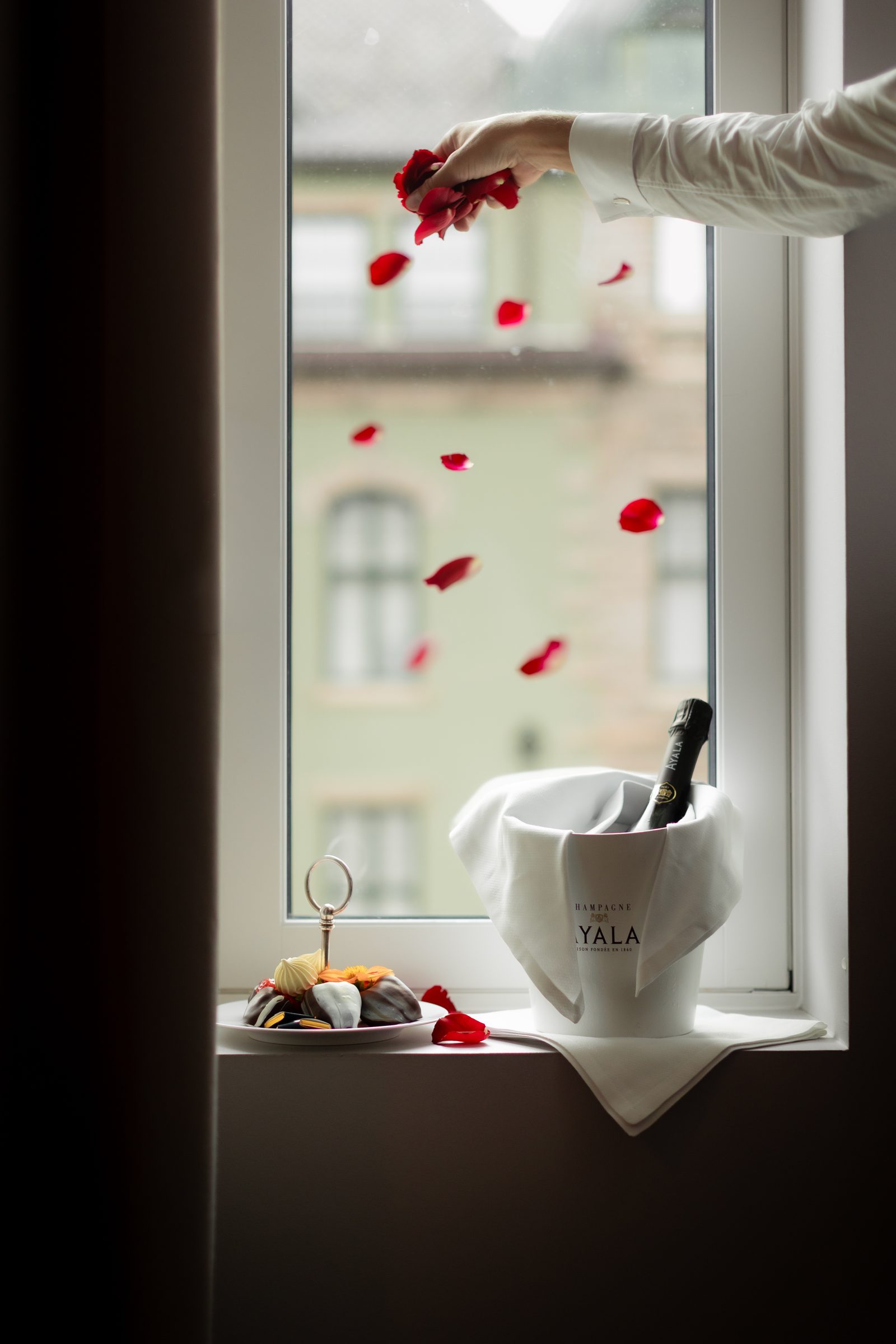 Wedding rose petals champagne window detail color