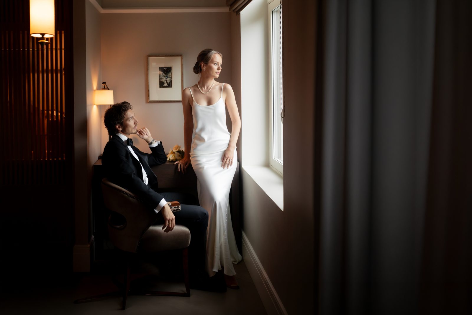 Wedding couple hallway window portrait color